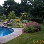 Pool Install with landscaping and stone decking