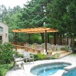 Pool Installation and Stone Decking With Pergola
